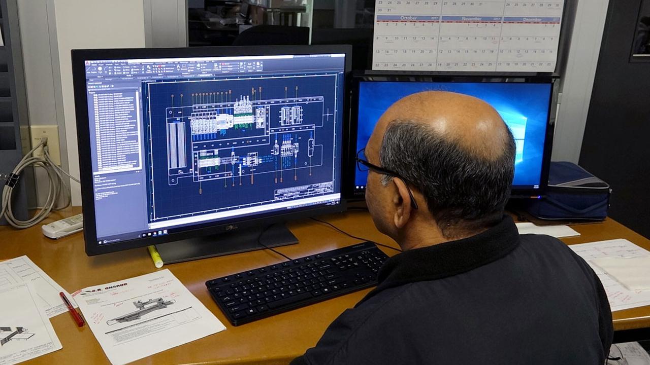 Engineer looking at specs